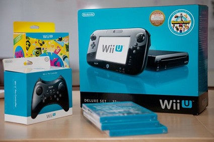 Il CEO di Nintendo Satoru Iwata e l'unboxing della Wii U