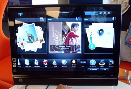 Computer HP Touch-screen Touchsmart PC IQ500 senza mouse e tastiera, ? un unico blocco con lo schermo. Prezzi interessanti. Rivoluzione prossima?